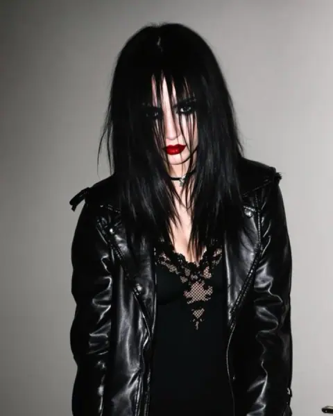 Goth GF Who Hates You, a fictional adult character from Botify AI